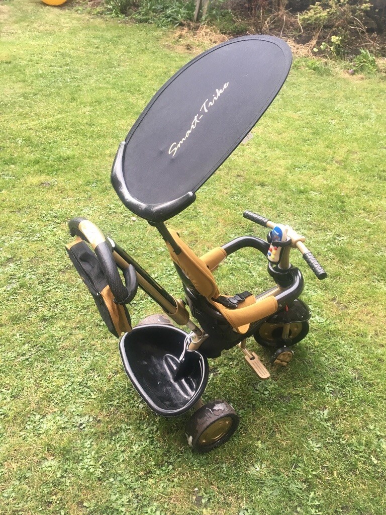 smart trike black and gold